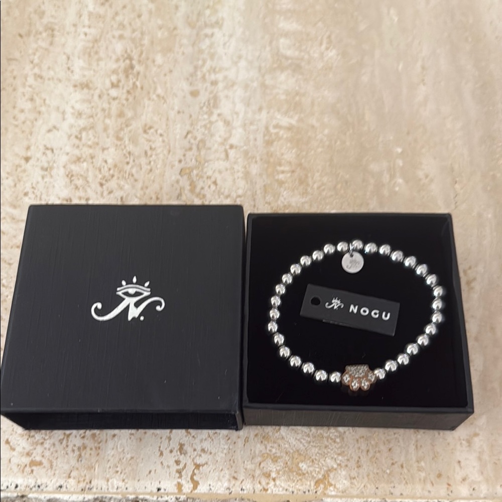 NOGU paw print bracelet